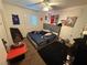 Bedroom with a large bed, black carpet, and a window with shutters at 1749 Green Apple Way, Las Vegas, NV 89142