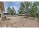 Spacious backyard, partially fenced, with mature trees offering shade at 240 N 19Th St, Las Vegas, NV 89101