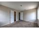 A bright bedroom is equipped with two closets, carpet, and is freshly painted at 240 N 19Th St, Las Vegas, NV 89101