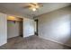A spacious bedroom with carpet flooring, two closets, and freshly painted walls at 240 N 19Th St, Las Vegas, NV 89101