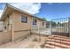 Exterior view of a home showing a fenced-in area and access steps at 240 N 19Th St, Las Vegas, NV 89101