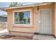 Close up view of front exterior with a large window and security door at 240 N 19Th St, Las Vegas, NV 89101