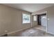 Hardwood floors in the living room with tan walls and large windows at 240 N 19Th St, Las Vegas, NV 89101