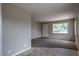 Living room with hardwood floors, neutral walls, and large windows at 240 N 19Th St, Las Vegas, NV 89101