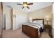 Bedroom with a window bringing in natural light, with white closet doors at 2467 Moonlight Valley Ave, Henderson, NV 89044