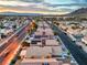 An aerial view of a neighborhood showcasing well-maintained homes against a picturesque horizon at 2595 Amber Crest St, Las Vegas, NV 89142