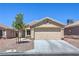 Charming single-story home featuring a two-car garage and low-maintenance desert landscaping at 2595 Amber Crest St, Las Vegas, NV 89142