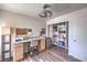 Comfortable office space featuring laminate floors, built-in desk, and ample storage at 2595 Amber Crest St, Las Vegas, NV 89142