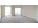 This bedroom features new carpeting and large sliding doors to the balcony at 2777 Paradise Rd # 1505, Las Vegas, NV 89109
