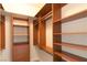 Walk-in closet featuring custom built-in shelving and drawers for optimal storage at 2777 Paradise Rd # 1505, Las Vegas, NV 89109
