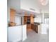 Stylish kitchen with granite countertops, stainless steel appliances, wood cabinets and modern finishes at 2777 Paradise Rd # 1505, Las Vegas, NV 89109