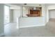 Open kitchen view featuring granite counters, wood cabinets, and an adjacent living area at 2777 Paradise Rd # 1505, Las Vegas, NV 89109