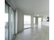 Spacious living room featuring tile floors, large windows, and access to a balcony at 2777 Paradise Rd # 1505, Las Vegas, NV 89109