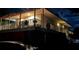 Exterior view of home at night, with a covered balcony space perfect for outdoor seating and entertaining at 2855 Rice St, Logandale, NV 89021