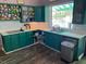 Kitchen with updated cabinets, white subway tile backsplash, solid surface countertops, and stainless steel appliances at 2855 Rice St, Logandale, NV 89021