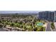 An aerial view shows the golf course and community of homes near the Las Vegas Country Club at 322 Karen Ave # 2807, Las Vegas, NV 89109
