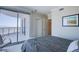 Bedroom featuring a seating area, private balcony and views of the city at 322 Karen Ave # 2807, Las Vegas, NV 89109
