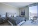 Bright bedroom with stylish furnishings, a comfortable bed, and a large window with a stunning view at 322 Karen Ave # 2807, Las Vegas, NV 89109