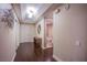 Elegant hallway features hardwood floors and tasteful decor, leading to the bathroom at 322 Karen Ave # 2807, Las Vegas, NV 89109