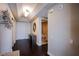 Hallway with hardwood floors, storage and access to a bathroom at 322 Karen Ave # 2807, Las Vegas, NV 89109