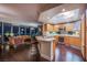 Open-concept kitchen featuring granite countertops and modern appliances, with city skyline view at 322 Karen Ave # 2807, Las Vegas, NV 89109