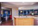 Bright kitchen featuring wooden cabinets, granite countertops, and scenic city views at 322 Karen Ave # 2807, Las Vegas, NV 89109