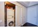 Modern laundry room equipped with washer, dryer, and storage at 322 Karen Ave # 2807, Las Vegas, NV 89109