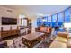 Comfortable living area with city views, sofas, and integrated kitchen space for seamless living and entertaining at 322 Karen Ave # 2807, Las Vegas, NV 89109