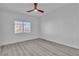 Comfortable bedroom featuring a modern ceiling fan and a view of the outdoors at 3318 N Decatur Blvd # 1035, Las Vegas, NV 89130