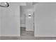 Hallway view with gray floors leading to the bathroom and bedroom at 3318 N Decatur Blvd # 1035, Las Vegas, NV 89130