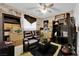 Comfortable living room with leather seating and ample storage at 3920 Geist Ave, Las Vegas, NV 89115
