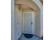 Inviting front entrance with a security door and stylish lighting fixture at 4487 Tomer Ln, Las Vegas, NV 89121