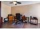 Spacious office with wood flooring and ample desk space, perfect for working from home or studying at 4487 Tomer Ln, Las Vegas, NV 89121