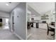 Bright and airy dining room, open to the kitchen with stainless steel appliances and modern finishes at 450 Intrepid Ct, Boulder City, NV 89005