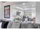 Bright kitchen featuring white cabinets, stainless steel appliances, and an open floor plan at 450 Intrepid Ct, Boulder City, NV 89005