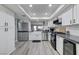 Bright, renovated kitchen featuring modern appliances and plenty of cabinet space at 450 Intrepid Ct, Boulder City, NV 89005