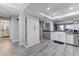 Spacious kitchen with stainless steel appliances, farmhouse sink, and abundant cabinet space at 450 Intrepid Ct, Boulder City, NV 89005
