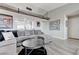 Inviting living room with wooden beam accents, comfortable seating, and open layout at 450 Intrepid Ct, Boulder City, NV 89005