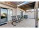Outdoor patio with mountain views, pergola, and comfortable seating at 450 Intrepid Ct, Boulder City, NV 89005