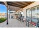 Relaxing covered patio with an outdoor kitchen and bar for entertaining friends and Gathering at 450 Intrepid Ct, Boulder City, NV 89005
