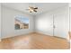 Cozy bedroom with natural light, featuring wood floors and a view at 4655 Gold Dust Ave # 210, Las Vegas, NV 89120