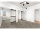 Bright bedroom featuring carpet flooring, a window and mirrored closet doors at 4655 Gold Dust Ave # 210, Las Vegas, NV 89120