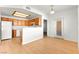 Bright living space with wood floors, kitchen, and dining area, perfect for entertaining guests at 4655 Gold Dust Ave # 210, Las Vegas, NV 89120