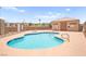 Community pool with clear blue water and a pool house offers a refreshing escape at 4655 Gold Dust Ave # 210, Las Vegas, NV 89120