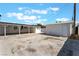 Expansive backyard featuring a detached garage and additional building space, offering ample potential at 517 N 22Nd St, Las Vegas, NV 89101