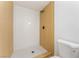 Tiled shower with modern fixtures and neutral wall accents in renovated bathroom at 517 N 22Nd St, Las Vegas, NV 89101