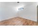Cozy bedroom featuring hardwood floors, a window, and ample natural light creating a relaxing atmosphere at 517 N 22Nd St, Las Vegas, NV 89101