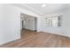 Bedroom with hardwood flooring, white walls, and a large window for natural light at 517 N 22Nd St, Las Vegas, NV 89101