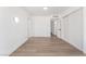 Bright bedroom with hardwood floors, closet space, and white walls at 517 N 22Nd St, Las Vegas, NV 89101