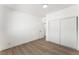 Bedroom featuring closet space, neutral walls, and modern flooring at 517 N 22Nd St, Las Vegas, NV 89101